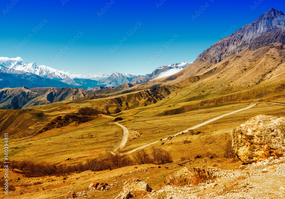 beautiful landscape of deserted Caucasus mountains with road, Russia, Republic Ingushetia