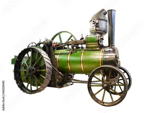 Fotografie old tractor with steam engine isolated on white