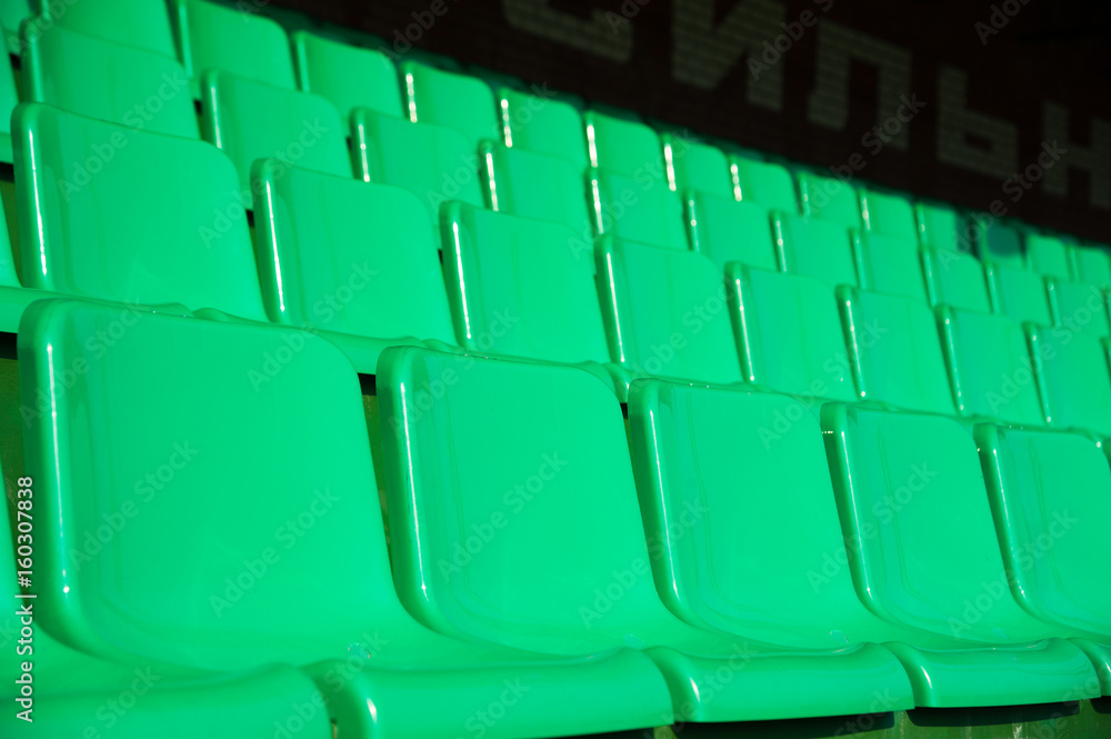 Obraz premium Empty green seats in stadium