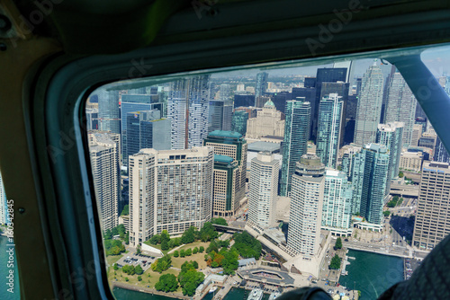 Aerial view at day of Toronto, Ontario, Canada through aeroplane window.