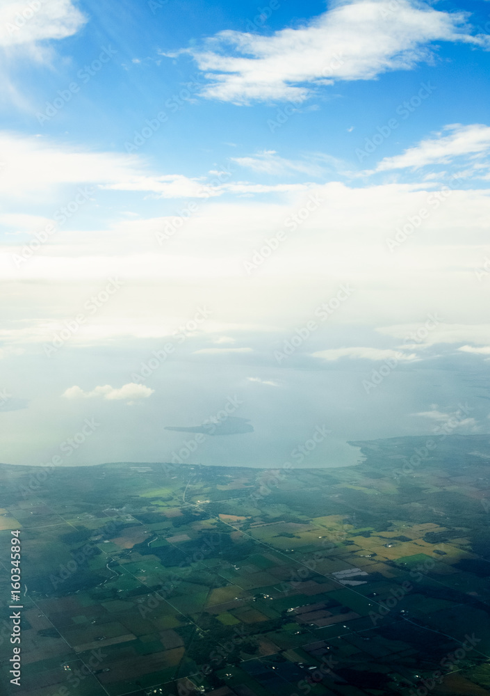 Aerial view from aircraft taken over Belgium showing landscape and cloud. Aerial view from aircraft taken over Belgium showing landscape and cloud.