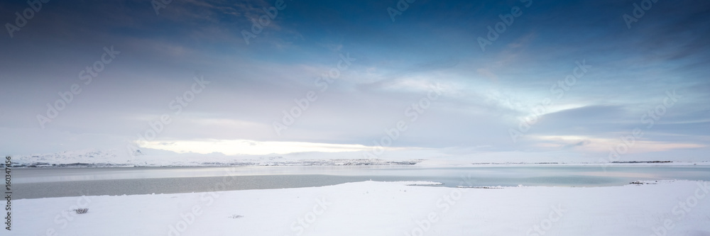Horizontal, panoramic snow covered landscape scenic at day, Iceland, Europe.