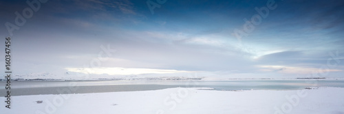 Horizontal  panoramic snow covered landscape scenic at day  Iceland  Europe.