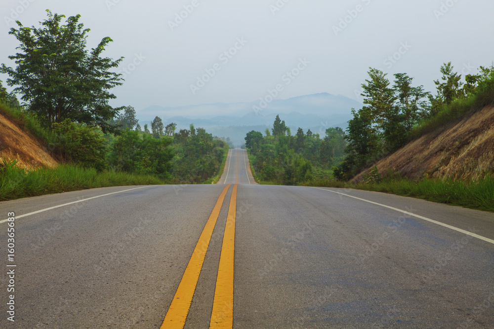 perspective of asphalt highway in rural scene