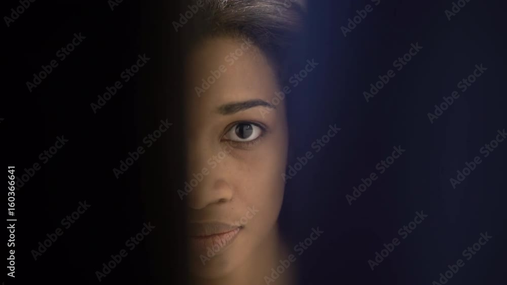 Woman eye watching through door slot. 4K Woman eye watching through door slot. 4K