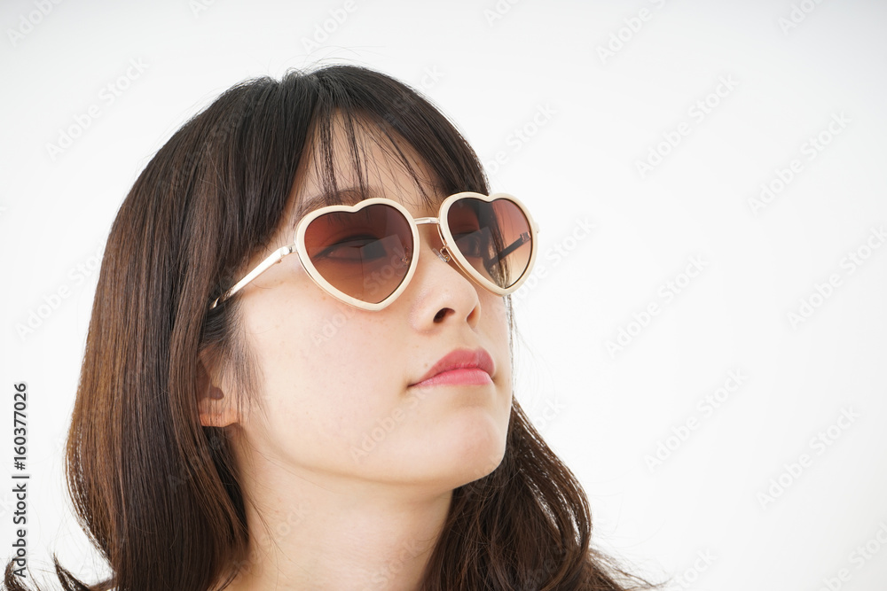 Young woman wearing sunglasses Young woman wearing sunglasses