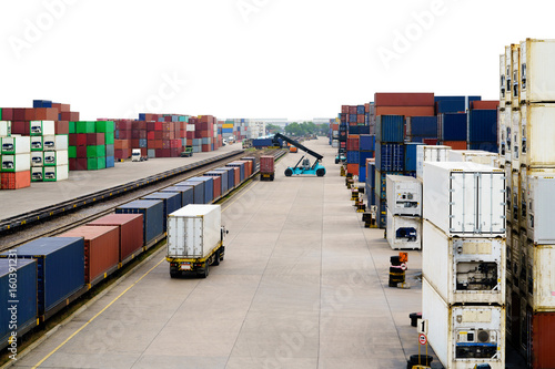 Stacker hold a container box and train freight cargo container.