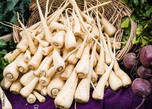 Freshly harvested parsnips at the market photo