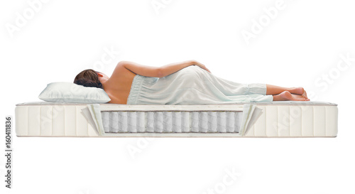 Woman sleeping on mattress photo
