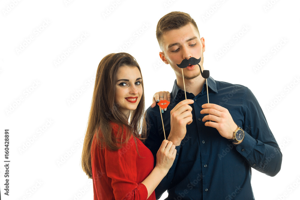 amazing fun couple keep near persons paper Dummies for photo and laughing amazing fun couple keep near persons paper Dummies for photo and laughing