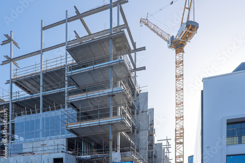 Building construction site for a low rise development with a crane in Viaduct Harbour and Wynyard Quarter Auckland, New Zealand, NZ