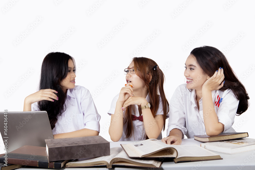 High school students discussing together High school students discussing together