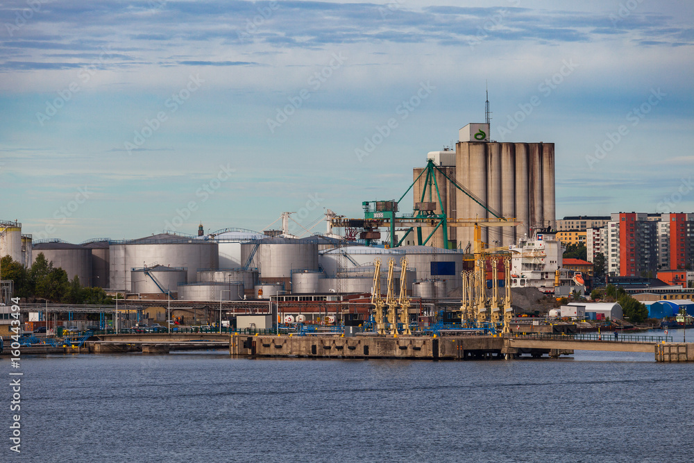 Fototapeta premium STOCKHOLM, SWEDEN - SEPTEMBER, 15, 2016: Oil loading and discharging terminal in industrial sea port