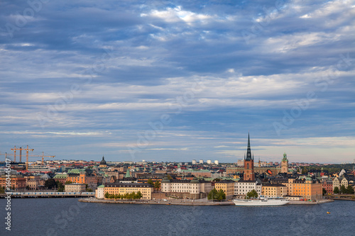 Skyline of old town and central part of city with embankment and boats. Stockholm, Sweden