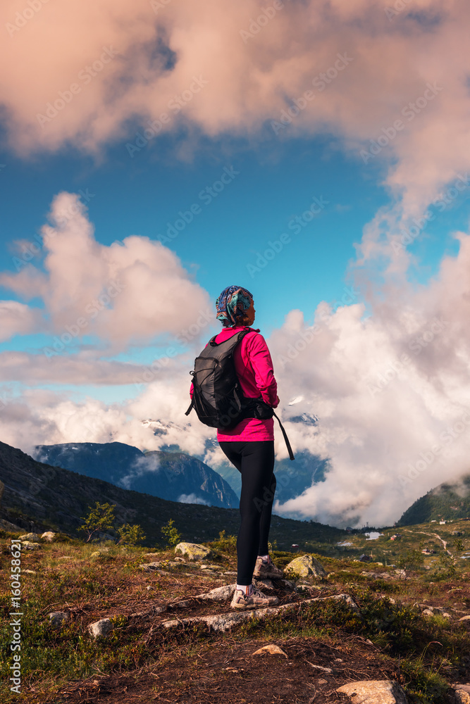 Happy woman enjoy lake and good weather in Norway Happy woman enjoy lake and good weather in Norway