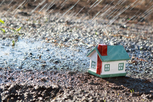 Little house in the rain. photo