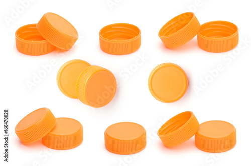 orange plastic bottle cap on white background
