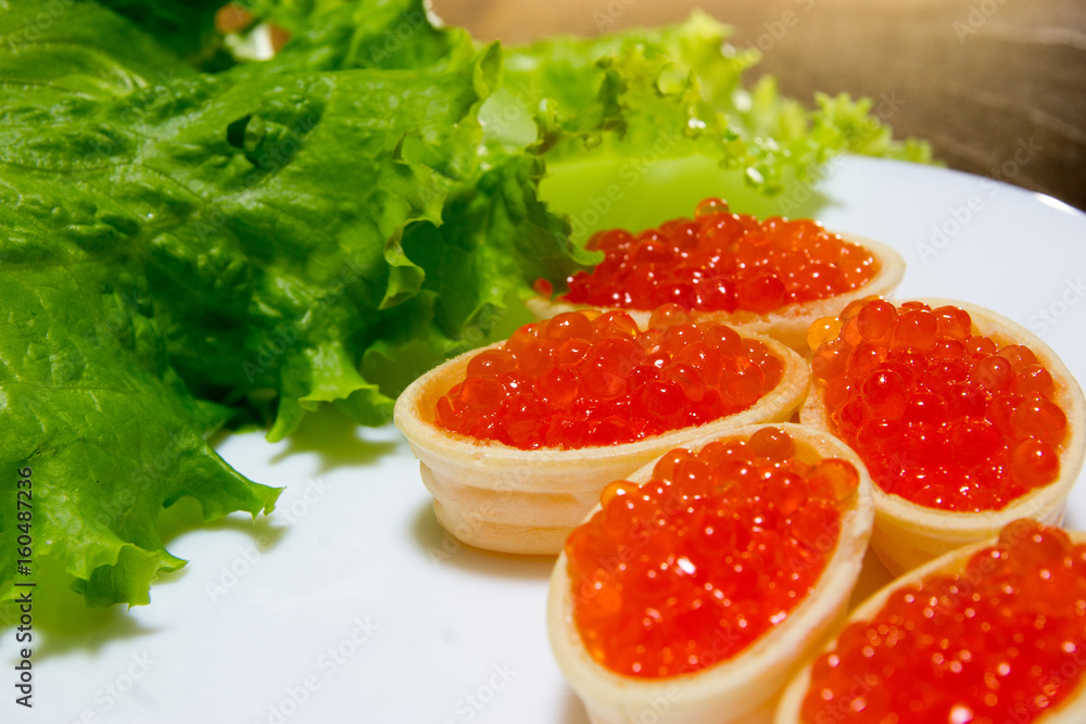 Delicious sandwiches with red caviar. Fresh bread for Breakfast.