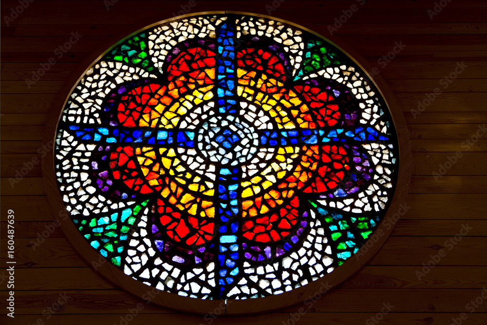 in the sanctuary the colorful rose window in the sanctuary the colorful rose window
