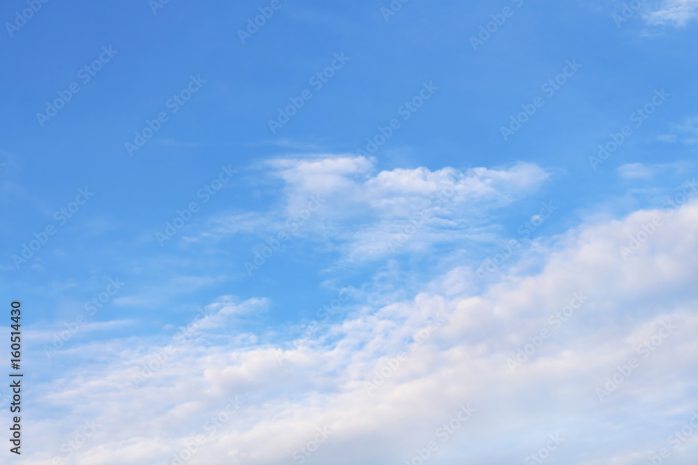 Fototapeta premium soft white clouds against blue sky.