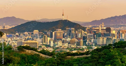 Aerial view of Seoul downtown cityscape and Namsan Seoul Tower from day to night. Seoul, South Korea. photo