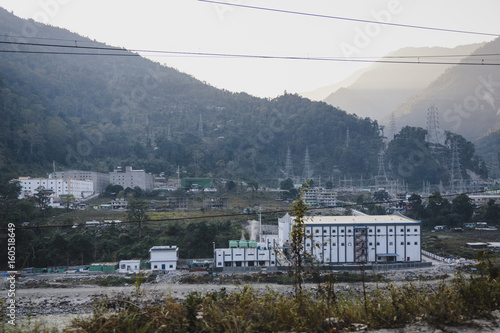 Powerplant with mountain in the sideway near Bagdogra. Darjeeling, India photo