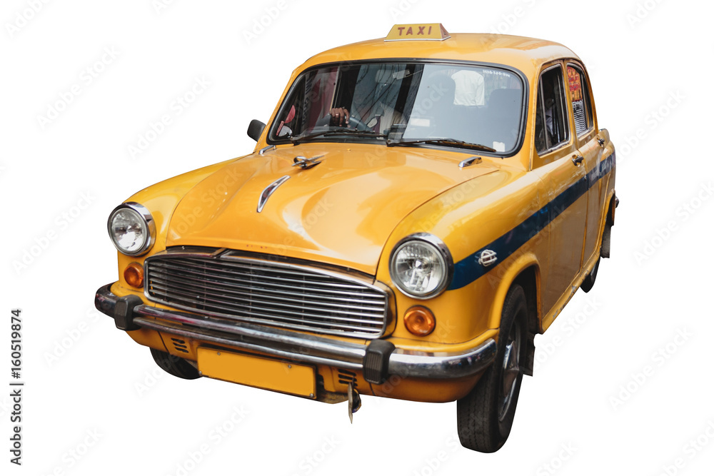 Isolated yellow vintage taxi in Kolkata, India