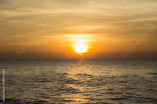 Sunset sunrise golden sky over the sea Thailand.