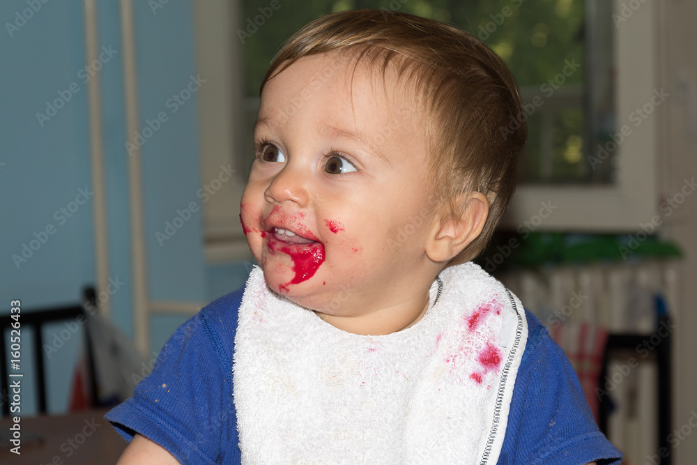 Messy and dirty baby is eating snack Messy and dirty baby is eating snack