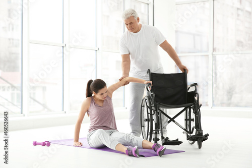 Young disabled woman with s...