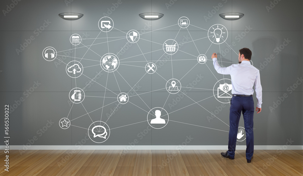 Businessman using social network interface on a wall 3D rendering Businessman using social network interface on a wall 3D rendering