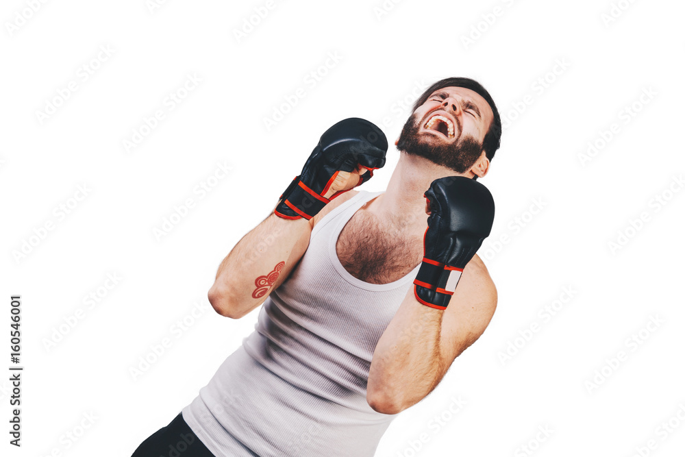 unshaved man in white t-shirt with tattoo in boxing gloves unshaved man in white t-shirt with tattoo in boxing gloves