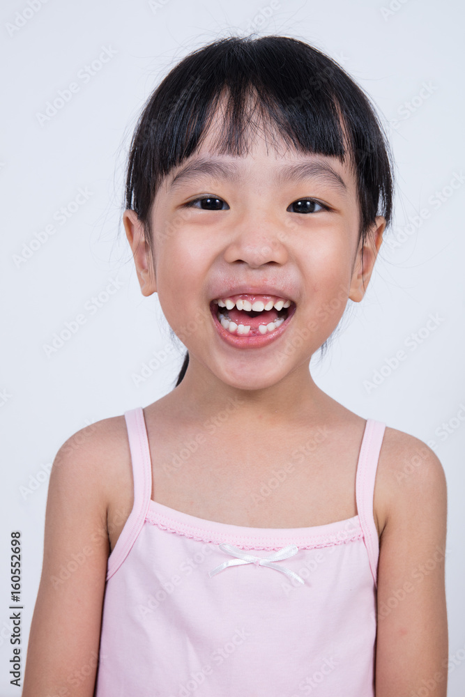 Happy Asian Chinese little girl with toothless smile Happy Asian Chinese little girl with toothless smile