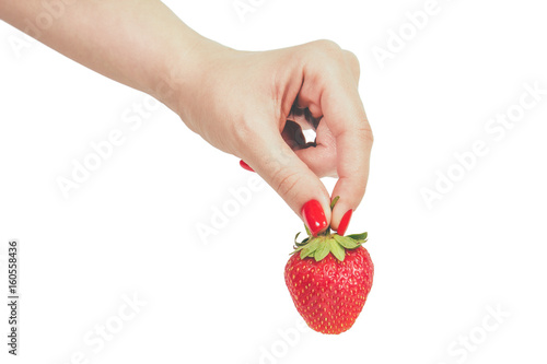 strawberries in hand isolated on white background
