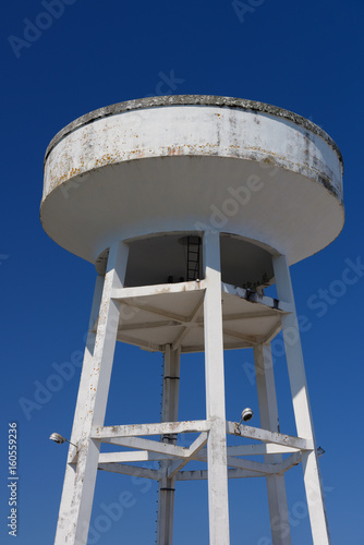 water tower against the blue sky