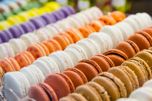 Lines of colorful  macaroons in intalian shop