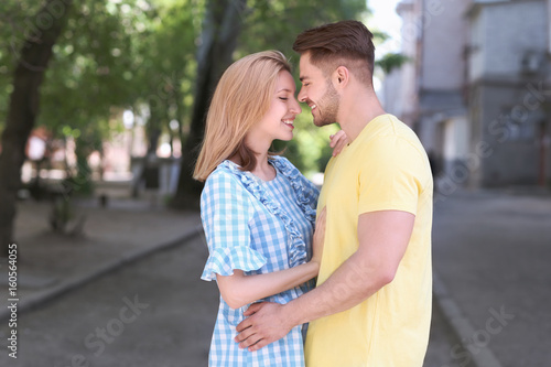 Happy young couple outdoors...