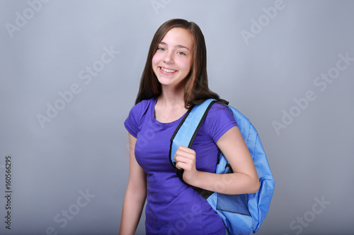 Cute pretty girl with schoo...