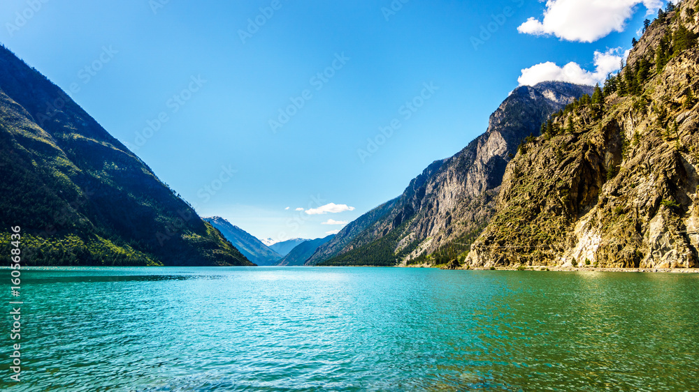 The clean green water of Seton Lake on the foot of Mount McLean near Lillooet. Seton Lake is located along Highway 99, the Duffey Lake Road, between Pemberton and Lillooet in southern British Columbia