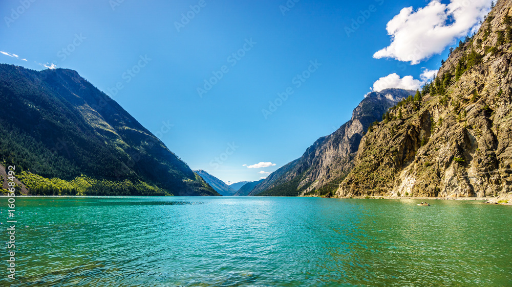 The clean green water of Seton Lake on the foot of Mount McLean near Lillooet. Seton Lake is located along Highway 99, the Duffey Lake Road, between Pemberton and Lillooet in southern British Columbia