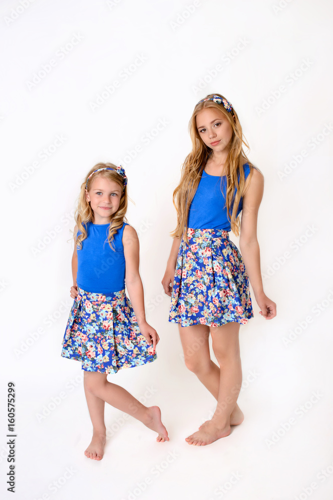 Two beautiful girls in a studio Two beautiful girls in a studio