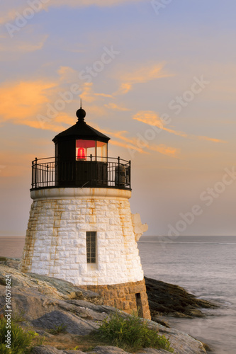 Lighthouse on a rocky shore. © andreiorlov