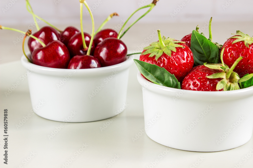Ripe strawberries, mint and black cherry Ripe strawberries, mint and black cherry
