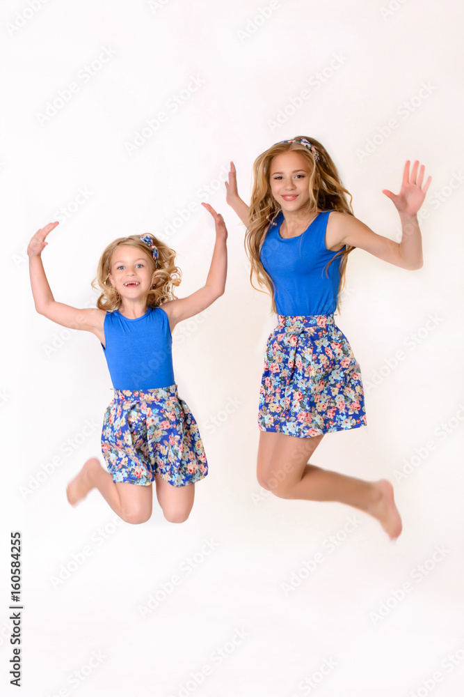 Two beautiful girls in a studio Two beautiful girls in a studio