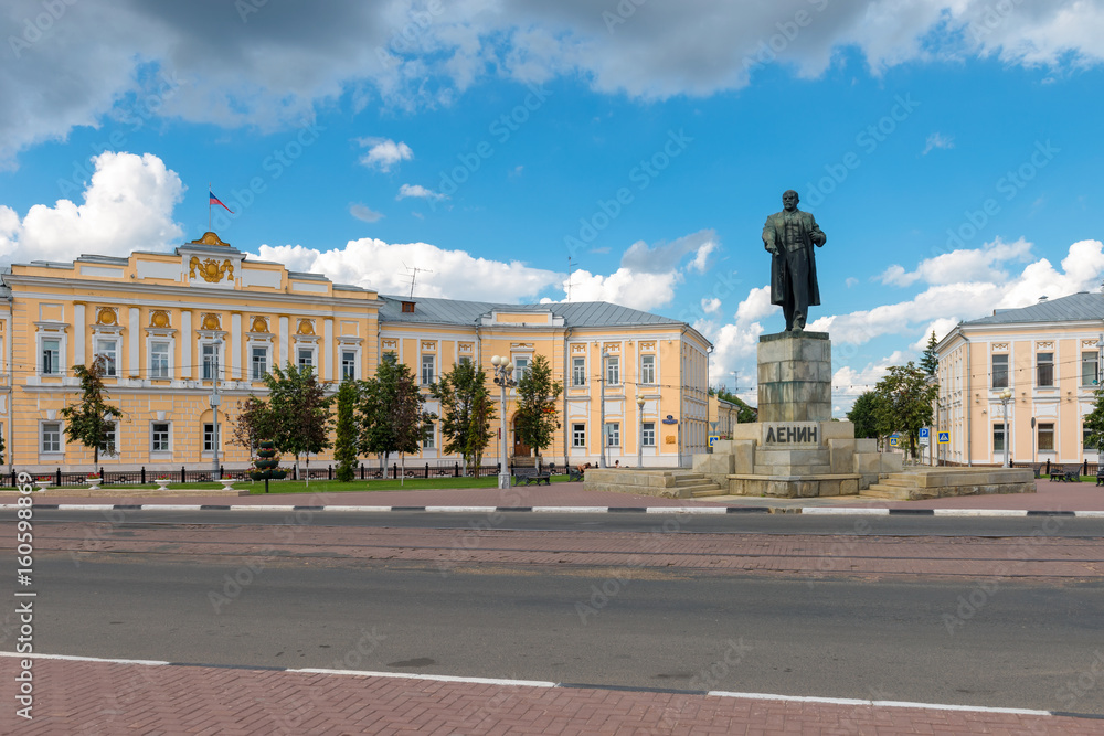 TVER, RUSSIA - JULY 31, 2016: Monument to V. I. Lenin at the background of administration of city district on The Sovetskaya street in the center of Tver city