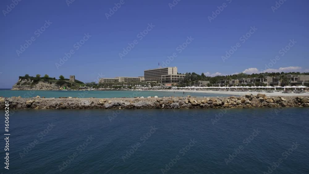 Day view of hotel complex at luxury resort in Kassandra Chalkidiki peninsula. Day view of hotel complex at luxury resort in Kassandra Chalkidiki peninsula.