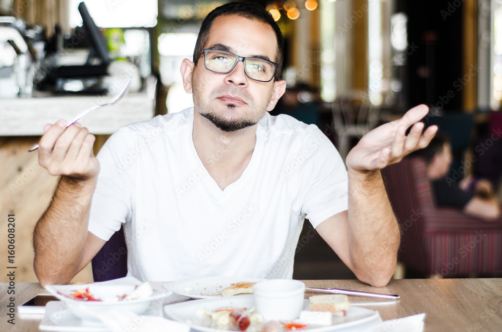 funny portrait man eating in restaurant funny portrait man eating in restaurant