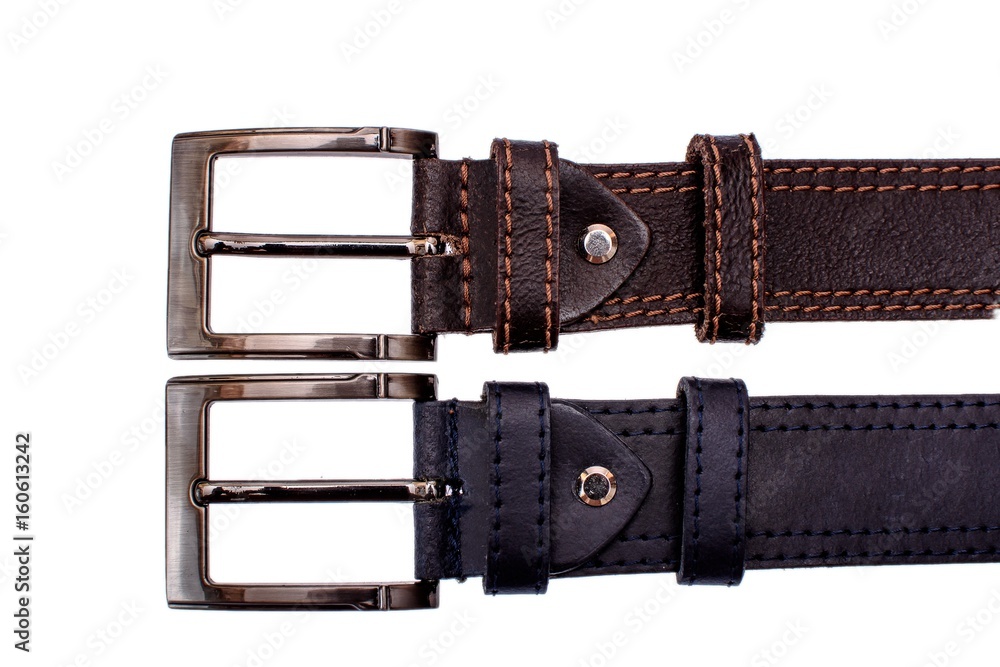 Several fashionable men's leather belts gray brown isolated on white background Several fashionable men's leather belts gray brown isolated on white background