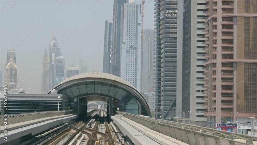 Subway in Dubai Skyscrapers downtown near Sheikh Zayed road. Travel tourism business in United Arab Emirates