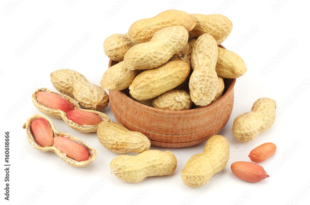 peanuts in wood bowl isolated on the white background peanuts in wood bowl isolated on the white background